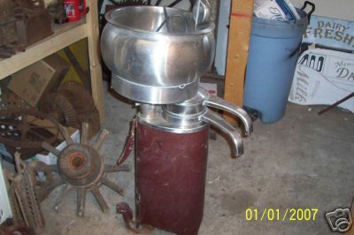 Vintage mccormick deering power washer cream separator
