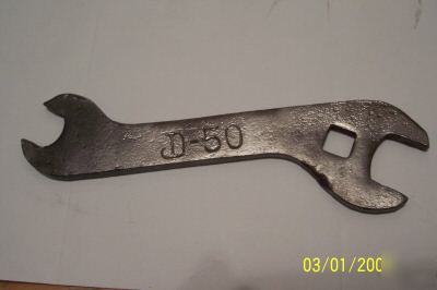 Antique wrench john deere jd-50 logo tractor