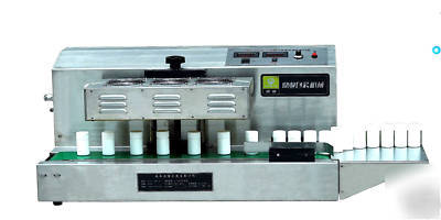 Induction sealer for plastic foil lid continuos sealing