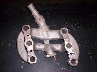 Wisconsin VH4D engine bobcat skidsteer engine manifold