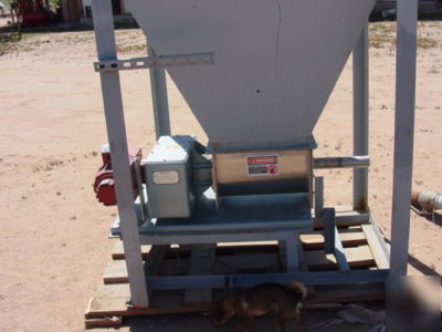 Bag dump station with acrison feeder.