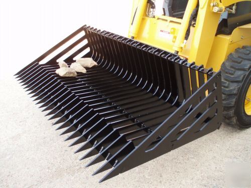 Magnum skid steer rock bucket with quick attach mount