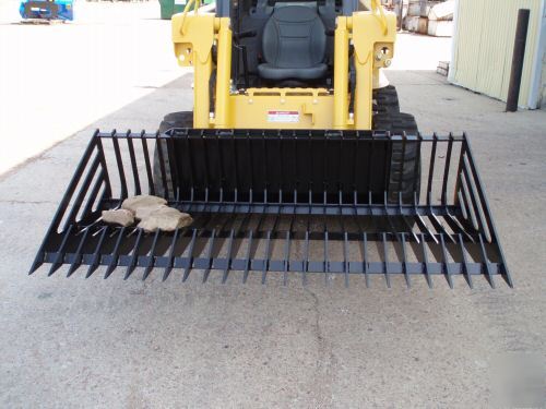 Magnum skid steer rock bucket with quick attach mount