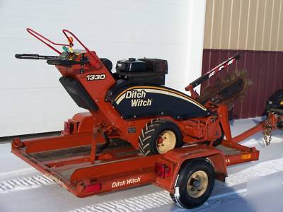 2003 ditch witch 1330 walk behind trencher and trailer