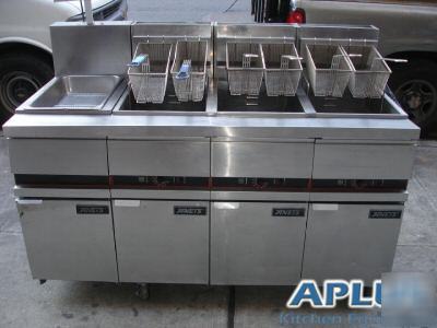 Three used anets deep fryers w/ work station & warmer