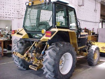 1994 ford 6640 tractor with push broom attachment