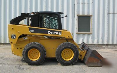 New john deere 332- low hours & tires, bucket included