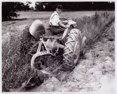 ford tractors plowing