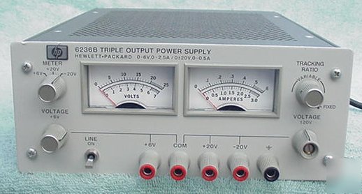 Hp 6236B triple output bench power supply with meters
