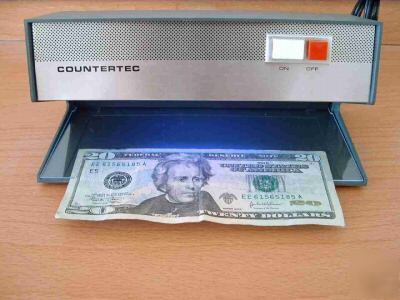 Counterfeit bill & document detector 