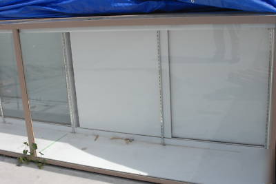 Merchandise showcases & matching register fixtures-used