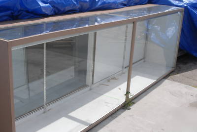 Merchandise showcases & matching register fixtures-used