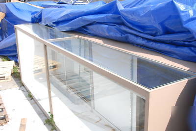 Merchandise showcases & matching register fixtures-used