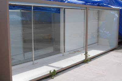 Merchandise showcases & matching register fixtures-used