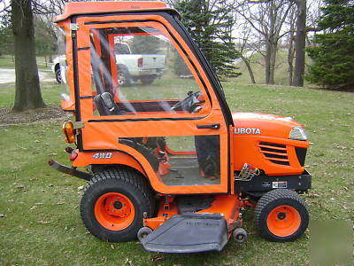 Kubota BX2350 hst 4X4 with 5' mowerdeck and heated cab