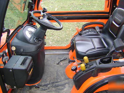 Kubota BX2350 hst 4X4 with 5' mowerdeck and heated cab