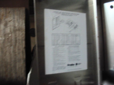 New bradley tampon / napkin vendor machine 25 cent turn 