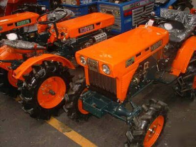 Manual on kubota B6000 compact tractor with rotovator 